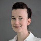 Dr.  Christine Arnold